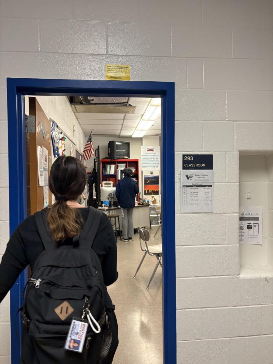 Senior Abby Brodsky walks into room 293, ready for an Honors Statistics class with Michele Ridge.