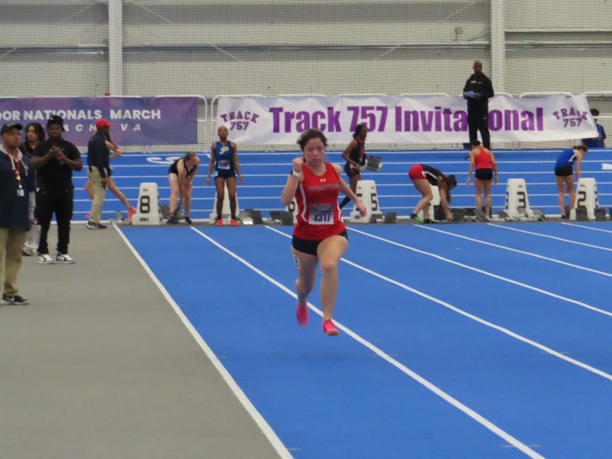 Senior Xinsu Lu runs the 55-meter event on Jan. 27 at the Last Chance Meet last season. "In my previous seasons, I ran the 55 m, 300 m, 500 m, and 4x200 m relay," Lu said.