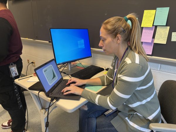 English and AP Seminar teacher Melissa Kaplan works on a spreadsheet for her AP Seminar students on Dec. 12. 