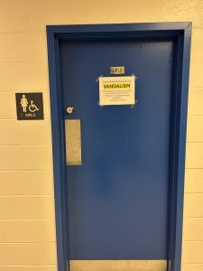 The sign outside the girls' bathroom by the health room, particularly the term vandalism, can be misinterpreted by students. "When we say vandalism, it's not any sort of graffiti or tagging, it is damage of actual equipment in the bathroom," Business Administrator Arlin De La Rosa said.