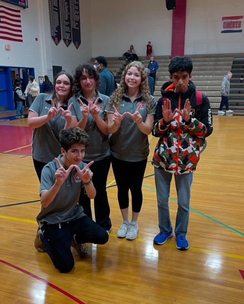 The Bocce team celebrates their win against Whitman (2-1) on Dec. 18.