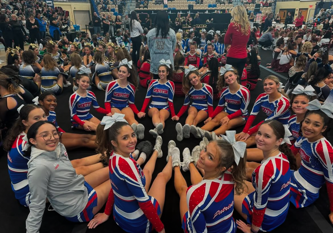 The cheer team placed fourth in the State Cheerleading Championship in early November. As a two season sport, their responsibilities as a team continue well into the new year as they cheer on basketball.