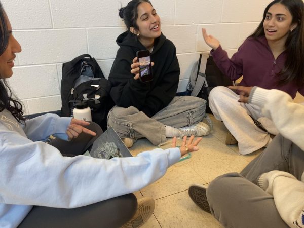 Senior Rayna Panikulam sits with her friends, seniors Leah Antony, Serena John and Ruthiga Veerasingham, at lunch on Monday, Feb. 24. Antony and John banter over what day graduation is while Panikulam and Veerasingham reminisce over senior sunrise. "I'm so grateful to have spent the last three and a half years surrounded by such beautiful and kind people and I'll cherish these moments for the rest of my life," Panikulam said.