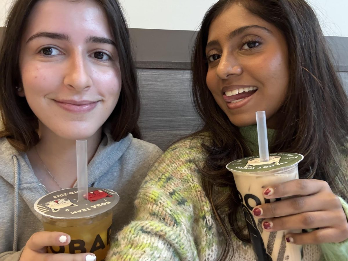 Seniors Abby Brodsky and Heerah Jayakumar enjoy bubble tea at the Rockville BobaPop location.