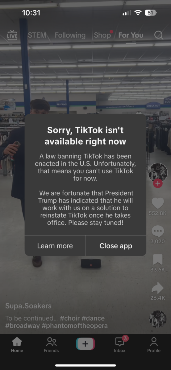 A message pops up on writer Jake Sklias's TikTok on Jan. 18, stating that TikTok is not available right now.