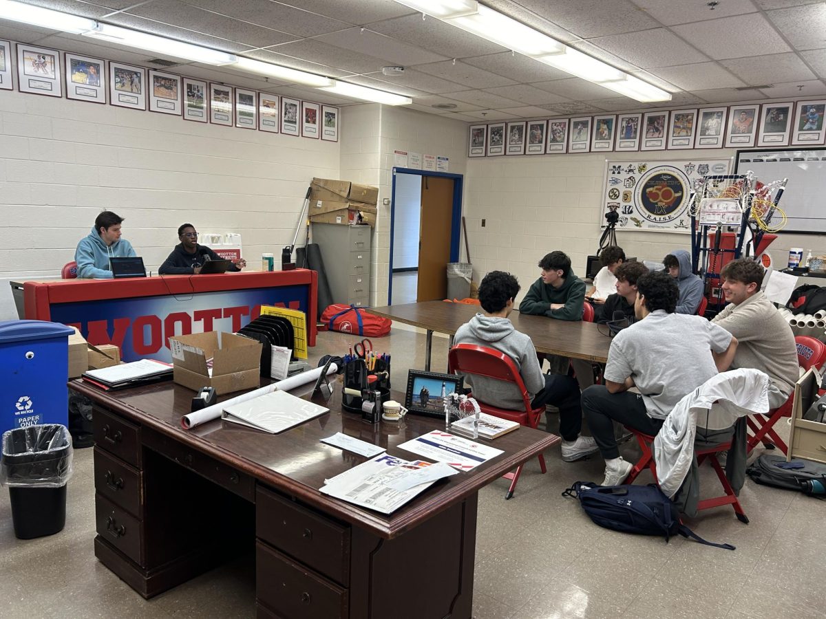 "GameTime with Jack and Josh" hosts junior Jack White and senior Josh Oluwaboro talk with seniors Jake Sklias, Will Balian, Max Greenberg, Kian Kaz and junior Cyrus Kaz in their Feb. 20 filming session. Seniors Toby Subiela and Jack Sullivan listen in as a live audience.