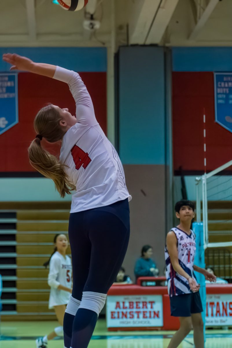 Co-ed volleyball junior Julia Kleinbussink hits the ball in a game last season against Einstein on April 17, 2024. "This season my main goal is to enjoy the last year of co-ed and have a strong team connection, as well as making it to the quarterfinals," Kleinbussink said.