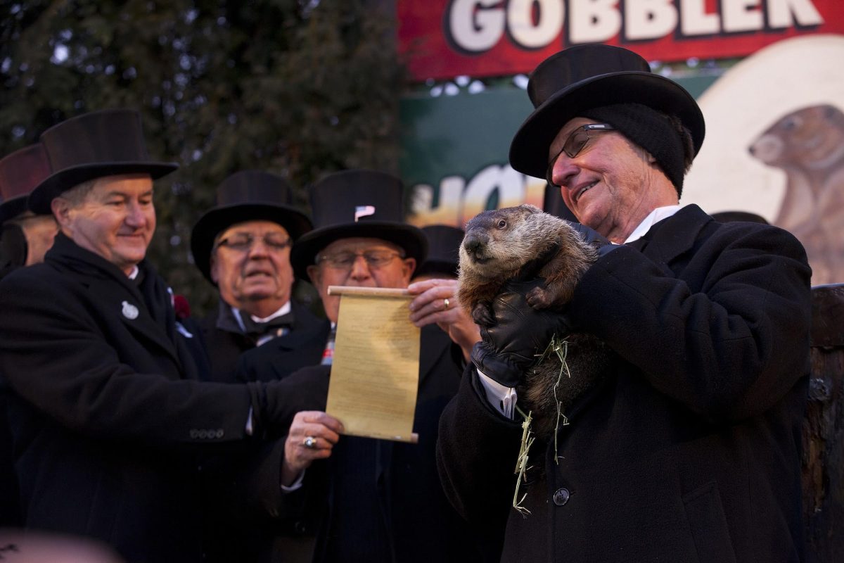 Punxsutawney Phil is  held by a member of the Groundhog Club's Inner Circle. The decision was that Phil did not see his shadow and that early spring would be coming.