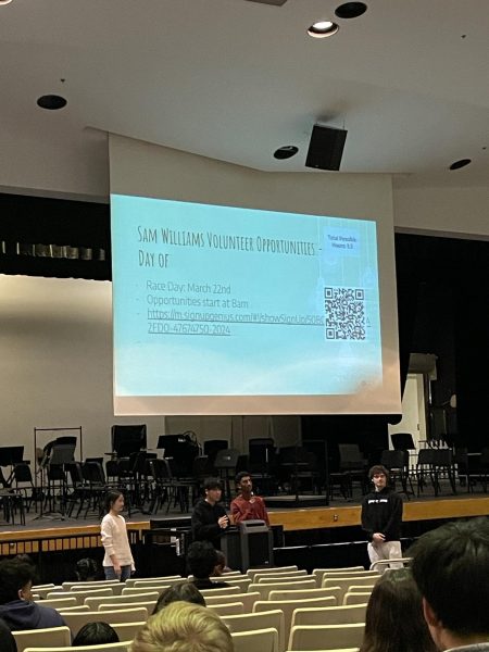 NHS junior board members Vikram Reddy and Ryan Shin discuss volunteer opportunities for the Sam Williams 5K at the monthly NHS meeting. "The event is an opportunity for the community to come together for a morning of wellness and fun," NHS co-sponsor Anne-Marie Steppling said.