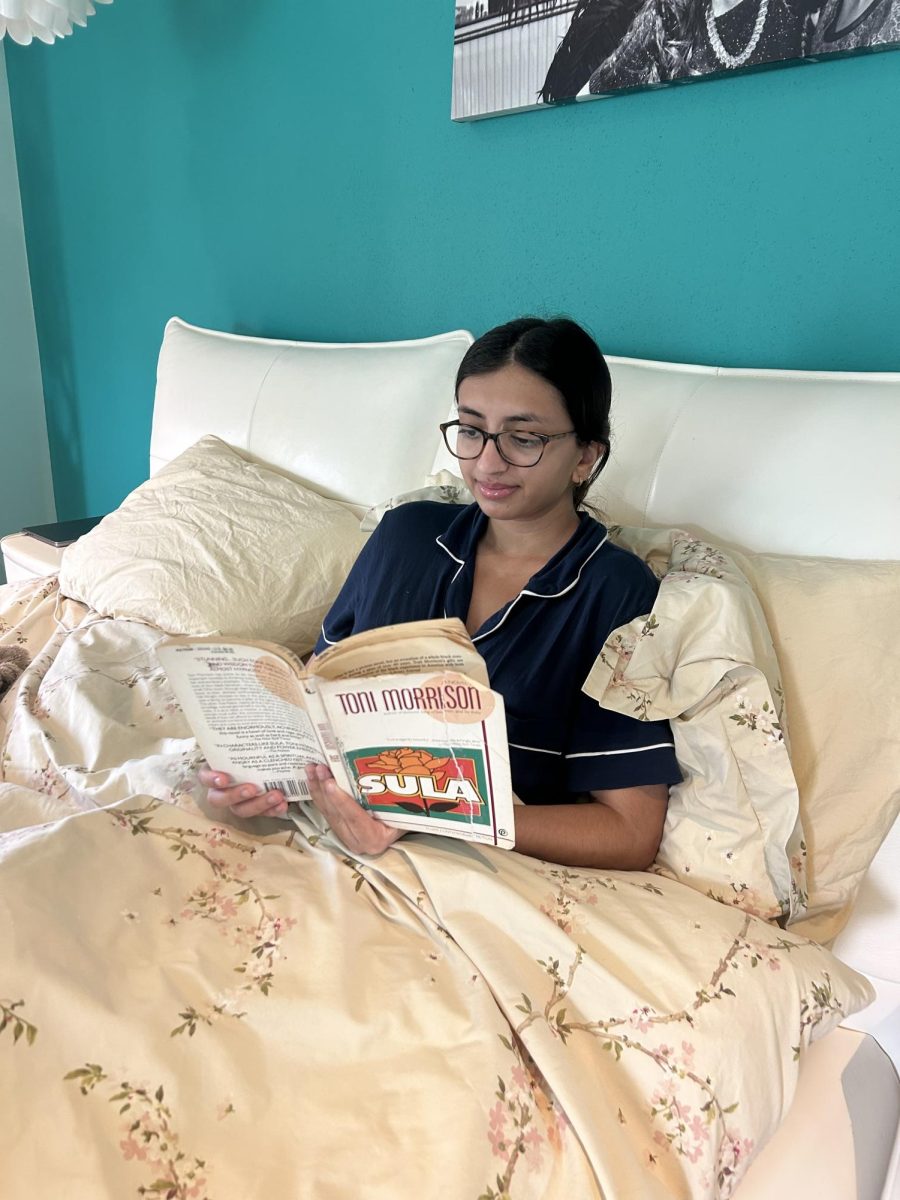 Senior Yana Kohli reads Toni Morrison's "Sula" in preparation for her class discussion the following day. Students went on to write an in-depth analysis of the book.