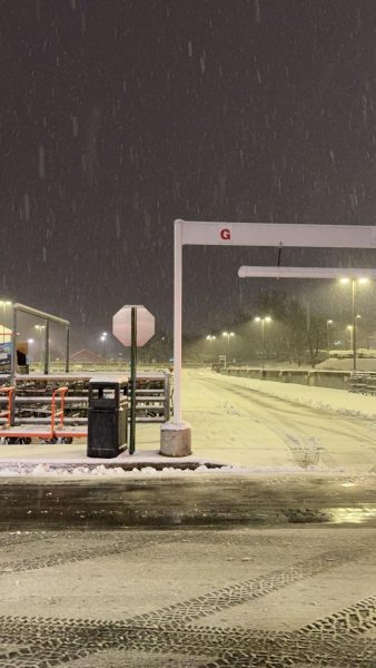 Snow covers the Gaithersburg Costco parking lot on Feb. 11. "Part of me wishes people didn't shovel snow because it looks really nice," junior Agamraj Singh said.