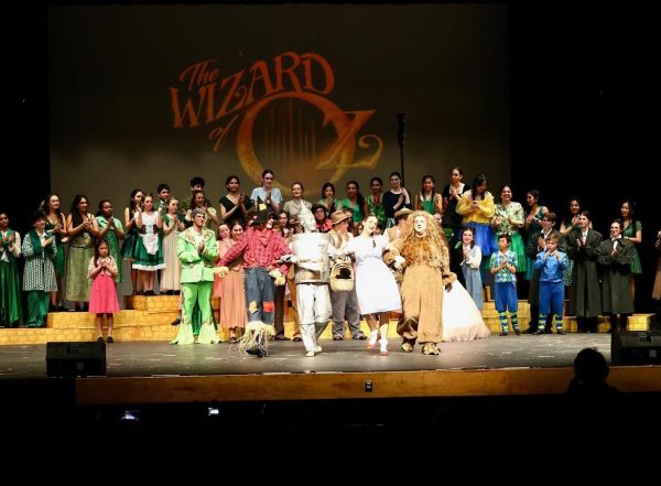 Members of the cast finish their performance of "The Wizard of Oz" with a curtain call.
