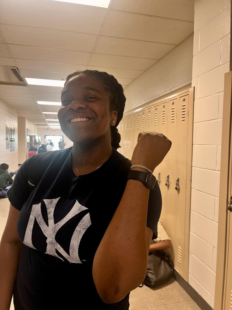 Sophomore Peace Tiam said she loves her Apple watch.