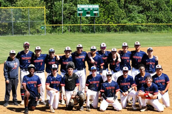 Varsity baseball celebrates after their regional semifinal win against Damascus on May 10.