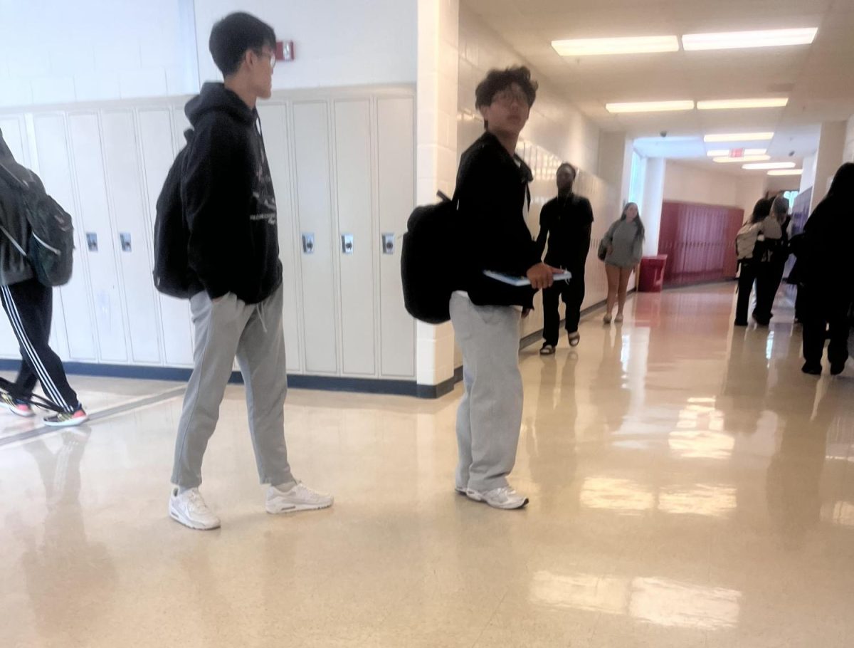 Students walk to their afternoon exam after a long morning of classes. Students this year were expected to go to school all day even if they had AP exams in the morning or afternoon. This is a change from previous years' policy.