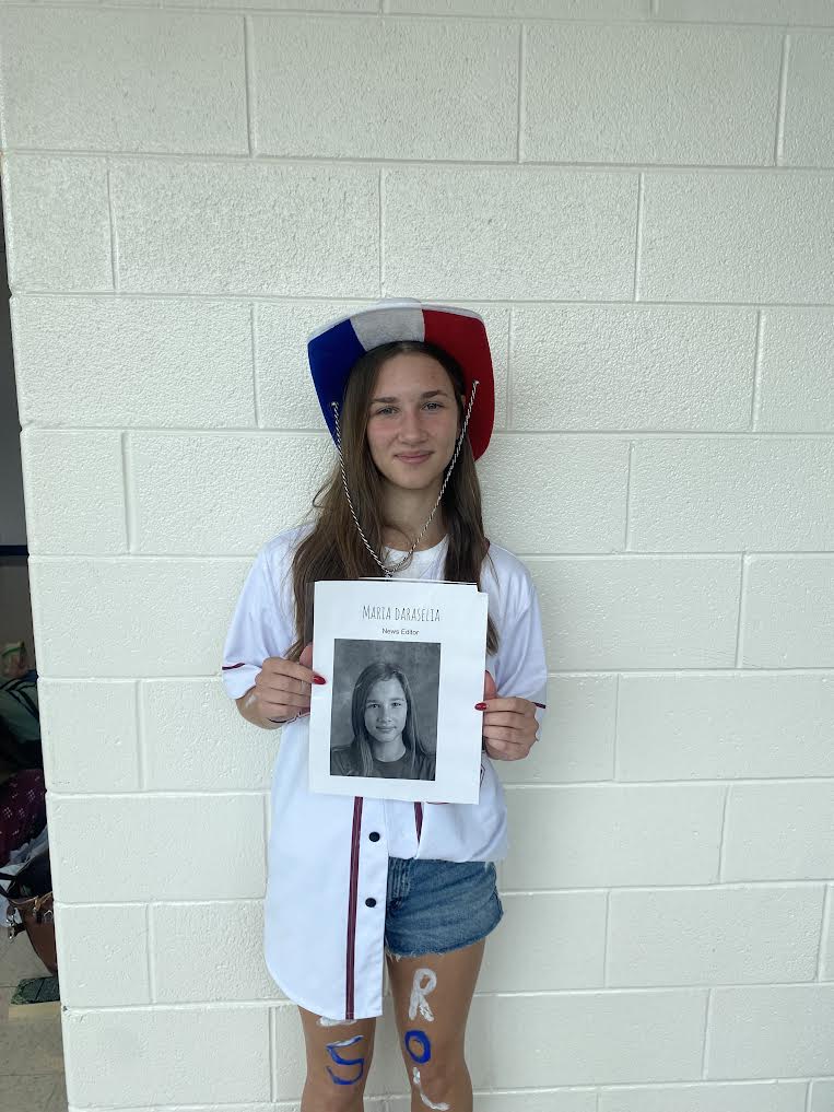 Senior Maria Daraselia (this writer) holds with the poster announcing her first board position for Common Sense.