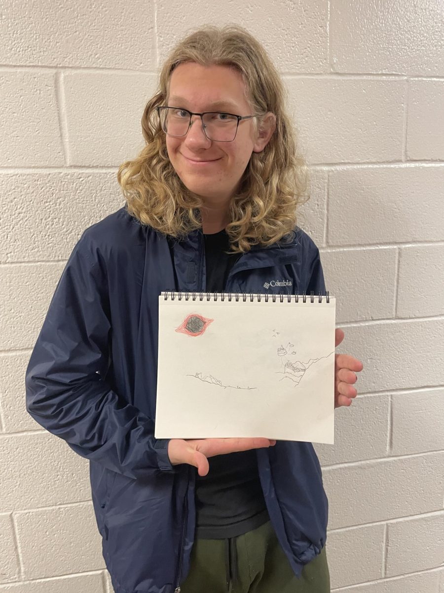 Sophomore Astrid Fishman displays a drawing of the Abandoned Realm, a location within her Dungeons & Dragons world/universe of Aturn. Aturn’s name came from fantasynamegenerators.com, as did the planet’s moon, Tidurn. The Abandoned Realm, in Fishman’s lore, is the first “universe” the gods created, before abandoning it due to magic becoming too powerful. The drawing is unfinished, but displays the Abandoned Realm’s signature Sun, which has turned black as it absorbs all magic in the realm.