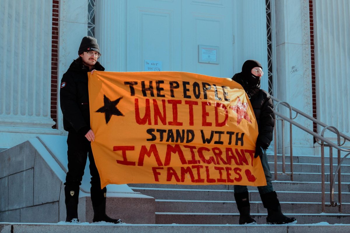 Protesters attend a "Hands off" rally in Washington, D.C., on Mar. 25 to protest President Donald Trump's immigration policies.