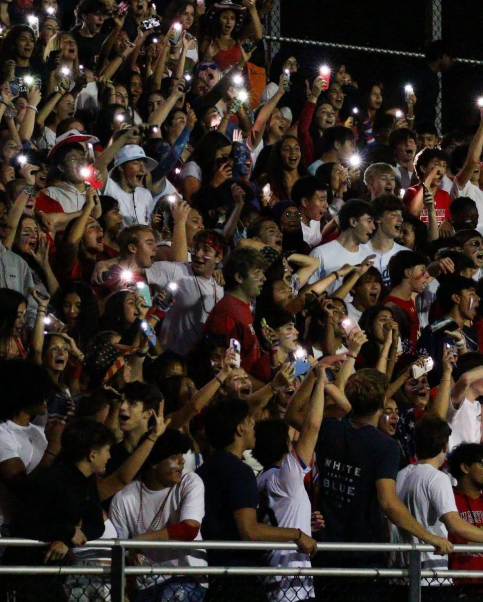 The student section during one of the football games in the fall demonstrates school spirit.