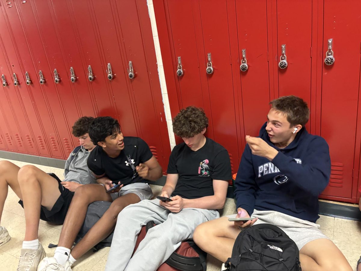 Juniors Owen Goozh, Vikram Mishra, Justin Heller and Bryson Filbert argue over the 100 men versus one gorilla debate. "I think gorilla would definitely get tired out even though my friends disagree," Filbert said.