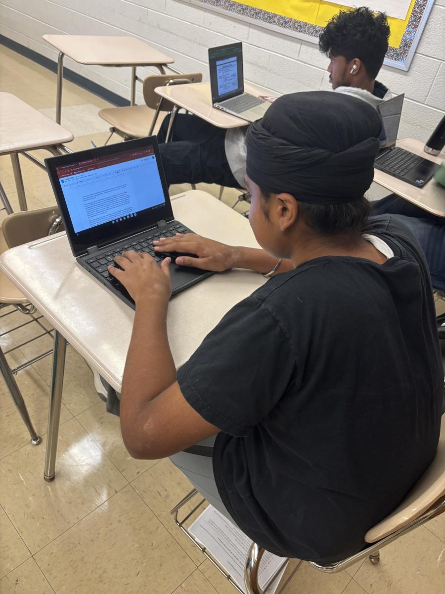 Sophomore Ansh Singh works on his AP Seminar work, which has built off of the summer work that he completed.