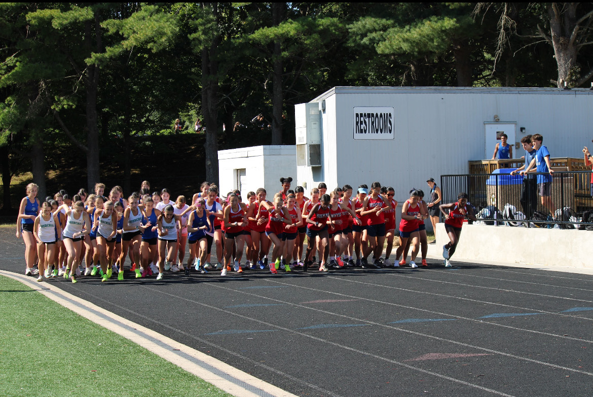 Girls' cross country begins their race against Churchill on the stadium track on Sept. 9. Photo courtesy Luke Gabrielle