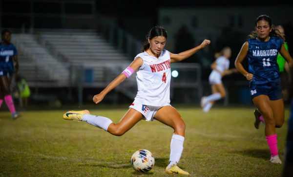 On Oct. 7 Dickinson College commit senior Megan Lomotan and her team take on Magruder. Lomotan lead the team to a 2-1 win in overtime.   Photo by Edwin Lomotan