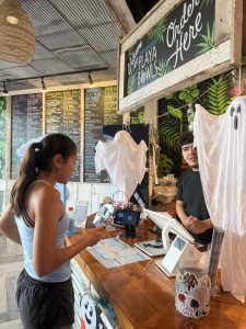 Junior Jia Micalizzi stops at Playa Bowls in Cabin John Village for a acai bowl after participating in a 5k run with her field hockey team.