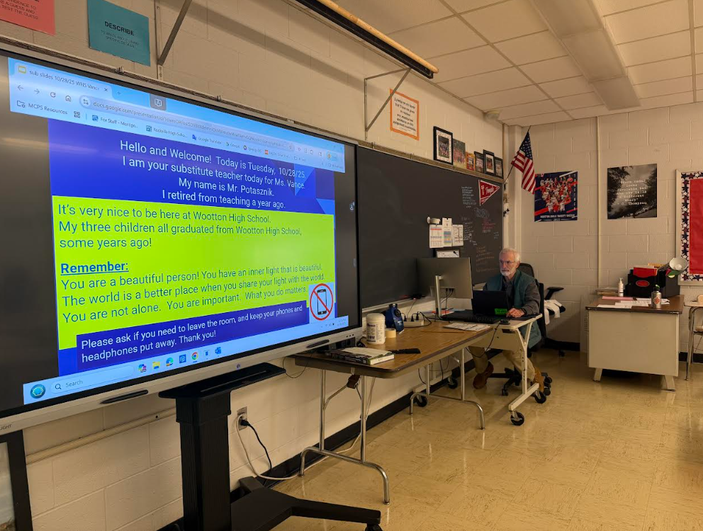 Substitute teacher David Potaznik enforces the "No phone" policy even during independent work time. The policy promotes student productivity and motivation in the classroom.