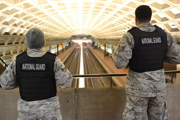 The National Guard monitors the McPherson Square station in Washington, D.C., in 2019 during a protest. President Donald Trump has recently mobilized the national guard in democratic cities across the country that he views as "high in crime." Photo used with permission from  Wikimedia Commons