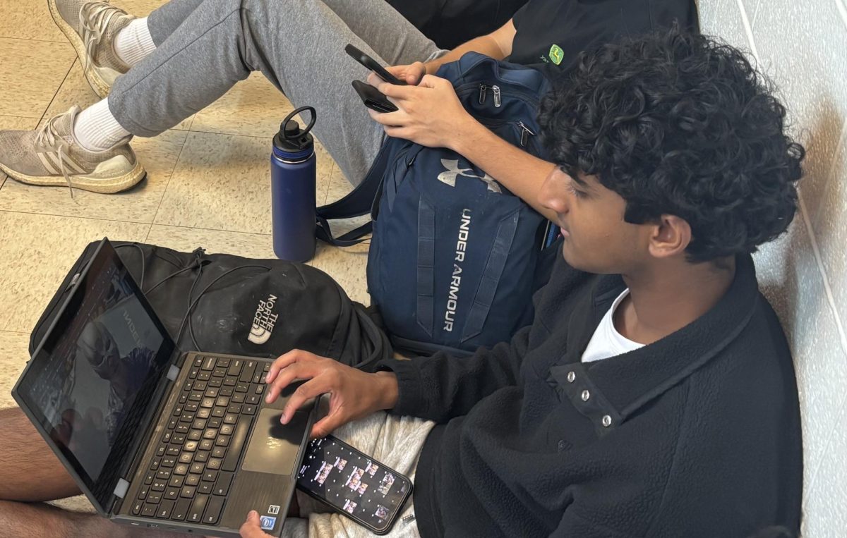 Senior Varun Rajesh watches the new season of "The Peacemaker" on HBO Max during lunch.