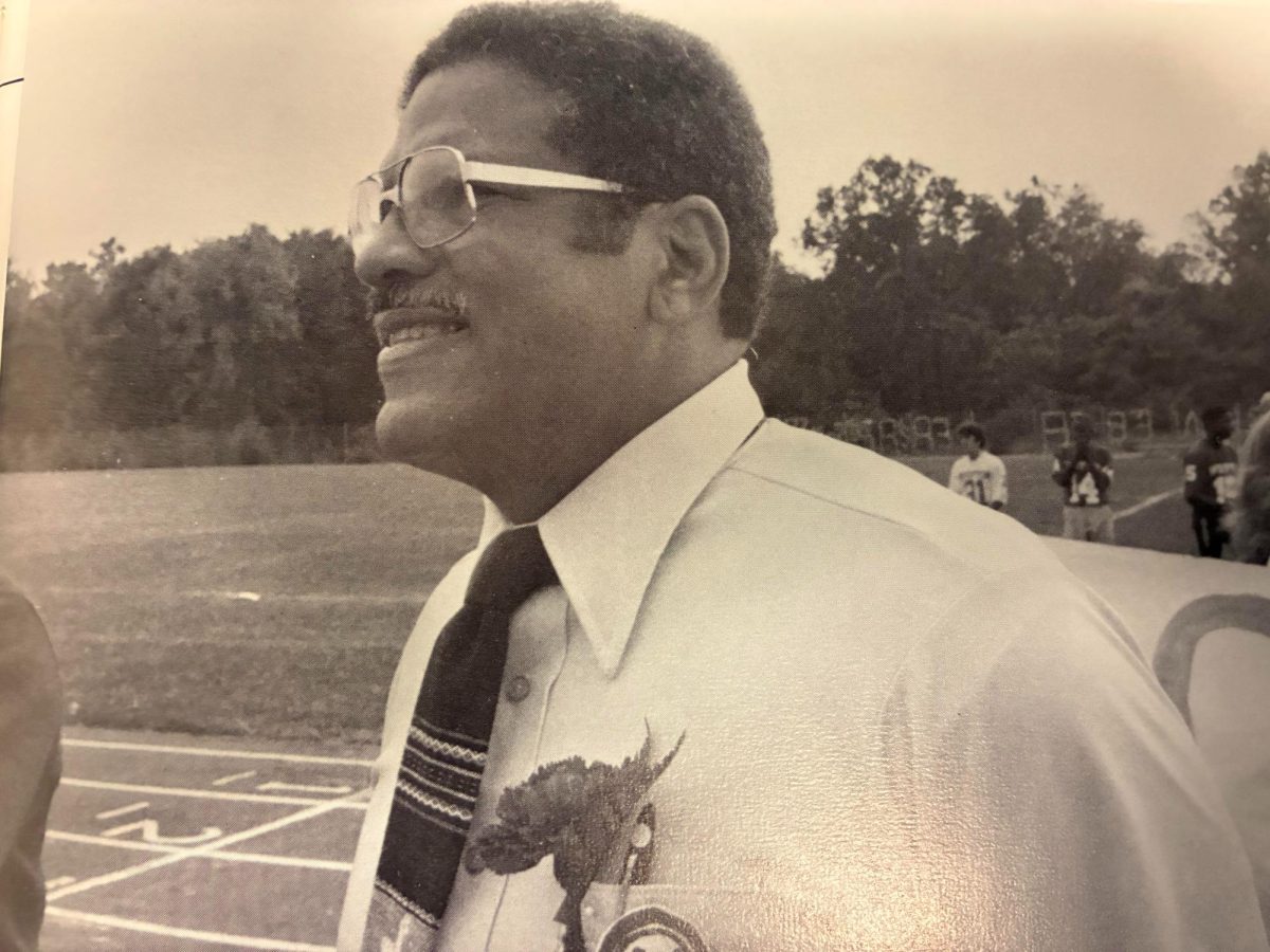 Dr. James A. Coles at a pep rally in 1983. Coles served as the school's principal for 22 years, from 1971 to 1993.Photo used with permission from 1983 Fife & Drum yearbook