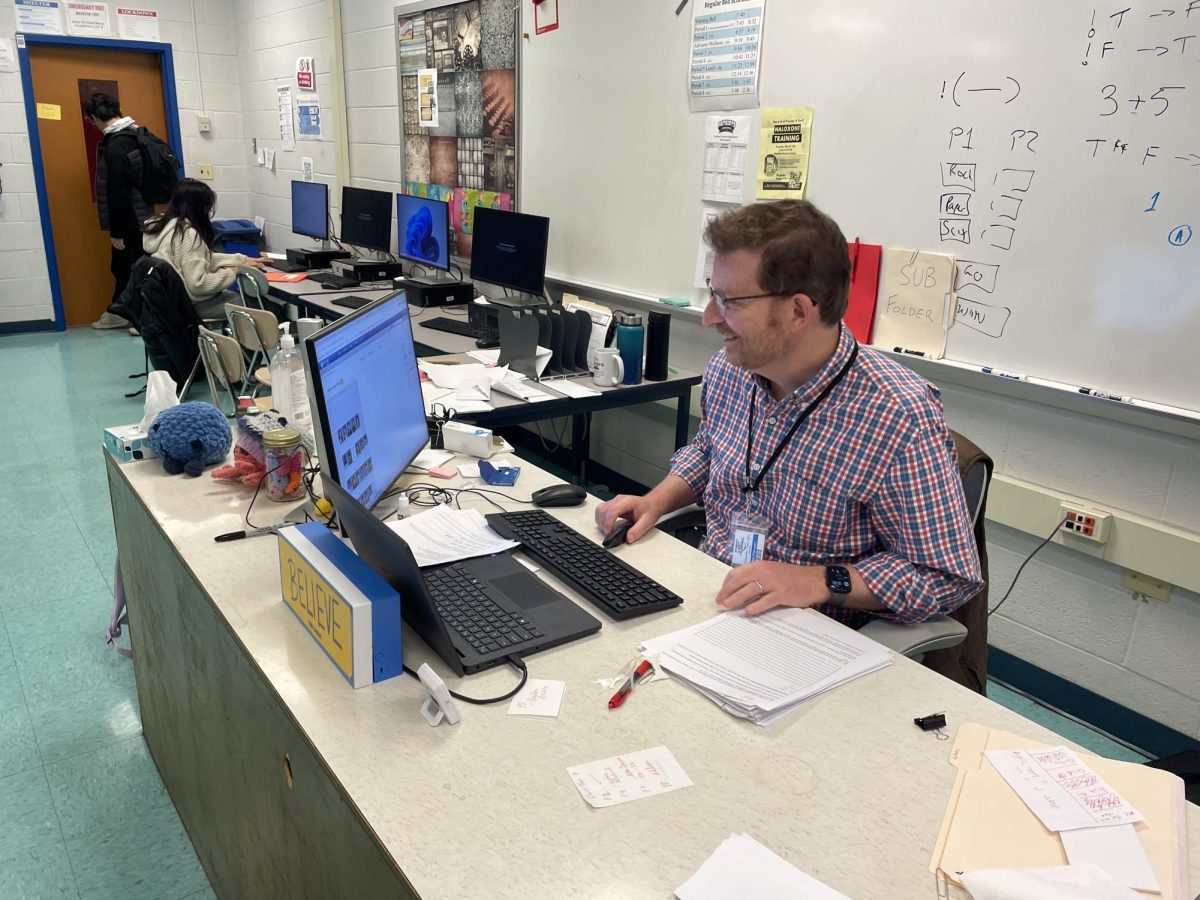 Computer science teacher Philip McTimoney works at his desk during advisory on Nov. 20.