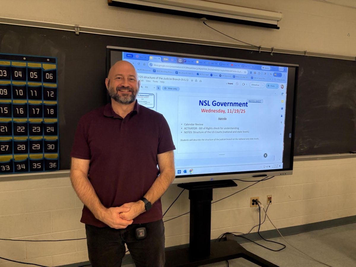 Christopher McTamany prepares for his AP Government students with an agenda and objective before school on Nov. 19.
