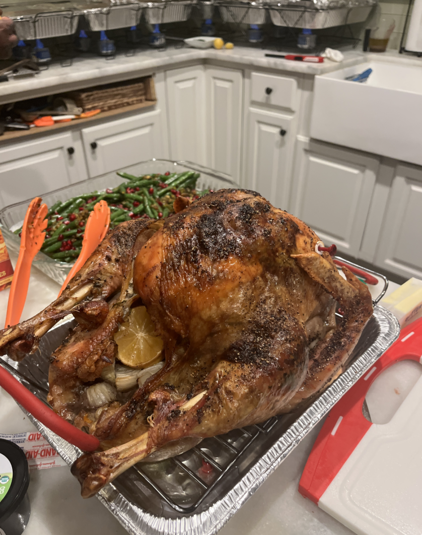 Roshali Nemaya's Thanksgiving turkey is filled with stuffing and accompanied by green beans. Photo by Roshali Nemaya