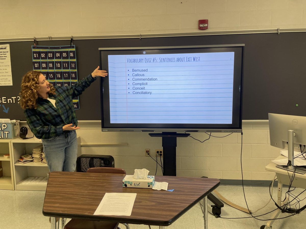 AP Literature teacher Emily Davis instructs her class for their vocab quiz about the novel Exit West. Davis said that long-term memorization is a useful skill that isn't practiced enough in schools.