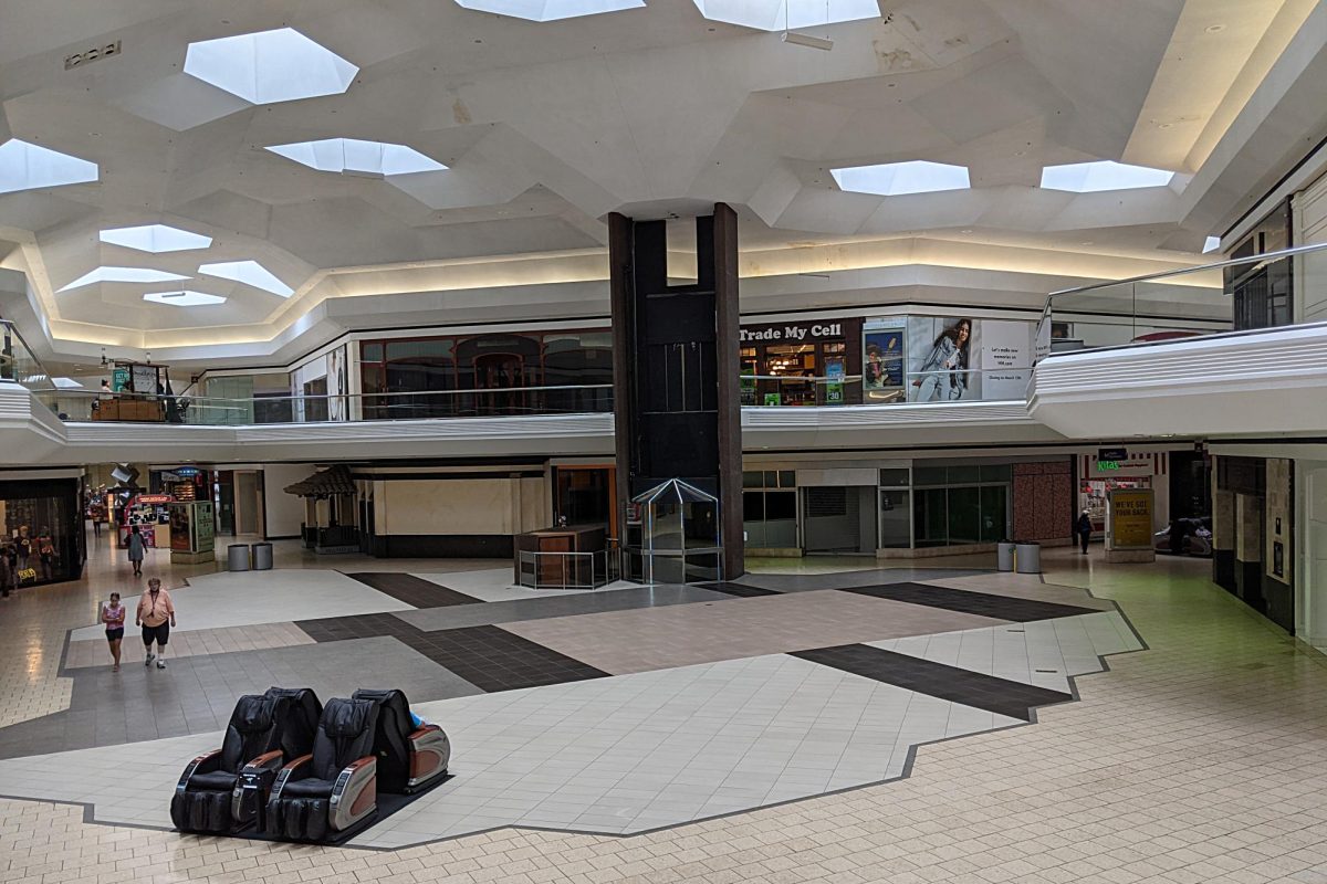 The once bustling Lakeforest Mall sits idle as a result of declining mall culture in Montgomery County. The mall opened in 1978 and closed in 2023, as the Gaithersburg City Council approved plans for redevelopment. "I think the declining mall culture is kind of sad to see because people would always gather together in malls and malls were a big part of my childhood as I had a lot of fond memories there,” senior Stephanie Yang said. "Lakeforest Mall center area Gaithersburg MD 2021-08-21 13-32-19 1" by G. Edward Johnson is licensed under CC BY 4.0.