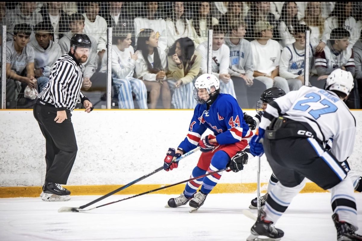 Senior Justin Heller plays for the Patriots club ice hockey team against Whitman on Oct.17. "I think hockey positively impacts my mental health because I have made so many friendships from my teams and it's made me much happier as a person. When I was injured and had to sit out for a few games in past years, it made me upset and realize how much I took hockey for granted," Heller said.
Photo courtesy Justin Heller