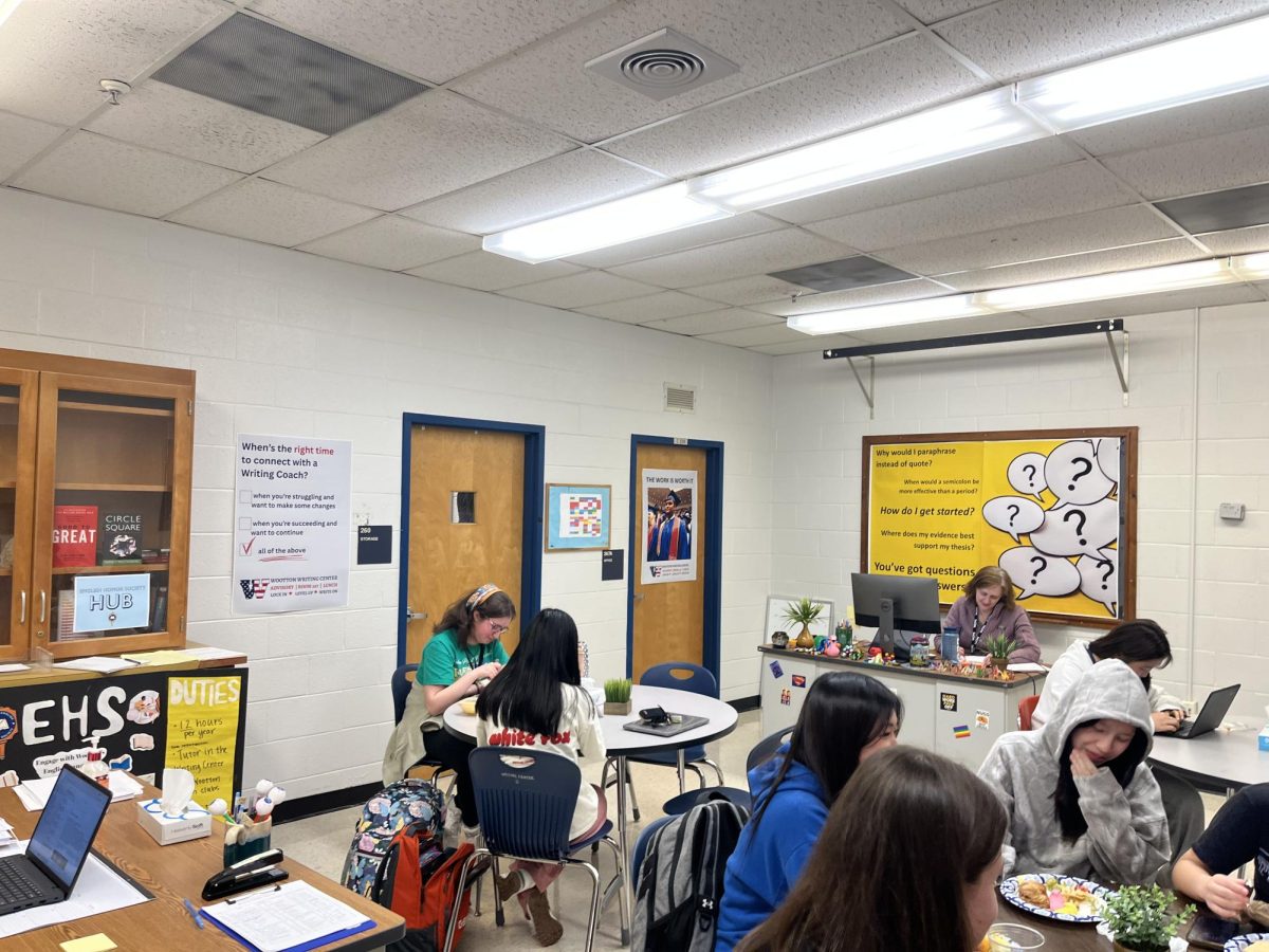 English Honor Society members tutor during lunch in the Writing Center. The Writing Center is in the midst of undergoing changes to its approach and physical layout. "We changed up the furniture in here so that it is more conducive to dialogue. The space is more purposeful, especially since it’s for everybody, not just for students who are struggling or who are doing incredibly well. It's for students across that entire spectrum,” Writing Coach Andrea Herman said.