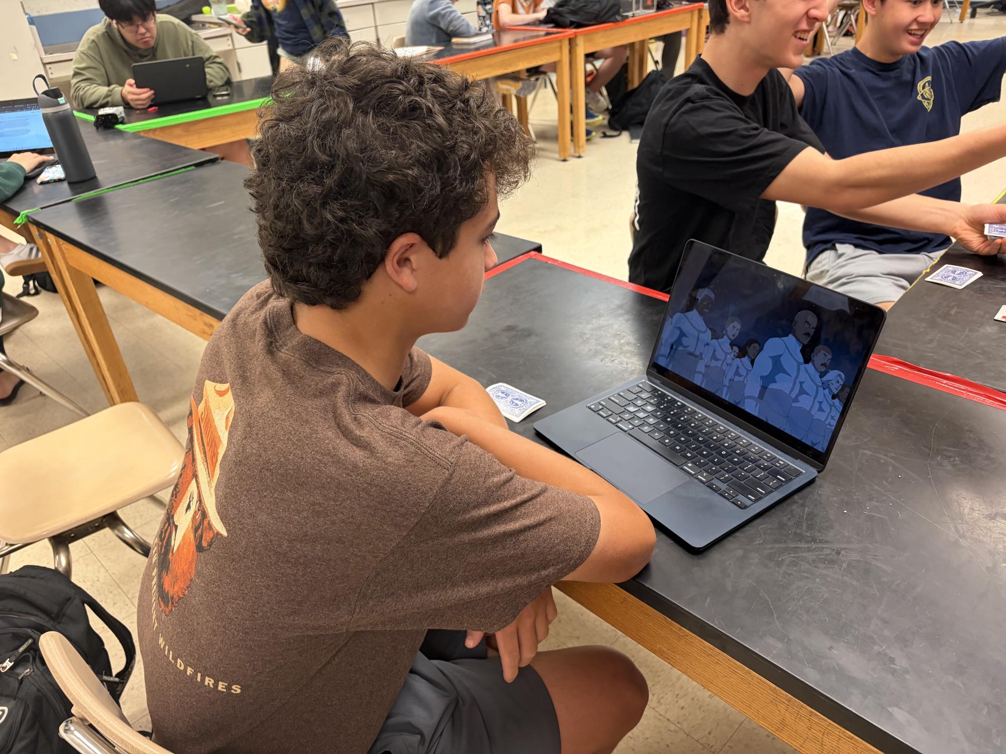 Junior Henry Jacobs watches the new season of "Invincible."