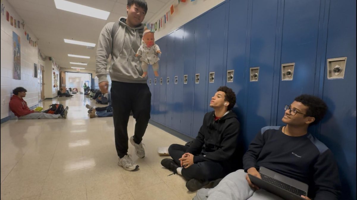 Senior Carter Morton talks to Senior Carlos Perez about the responsibilities that come with having a baby. "It is very over whelming and I did not think it would be this much work," Morton said. 