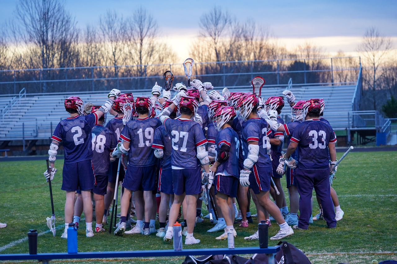 Boys' lacrosse played Magruder on March 25 as their first game of the season, and beat them 11-10 in a close game. Photo courtesy Max Lee