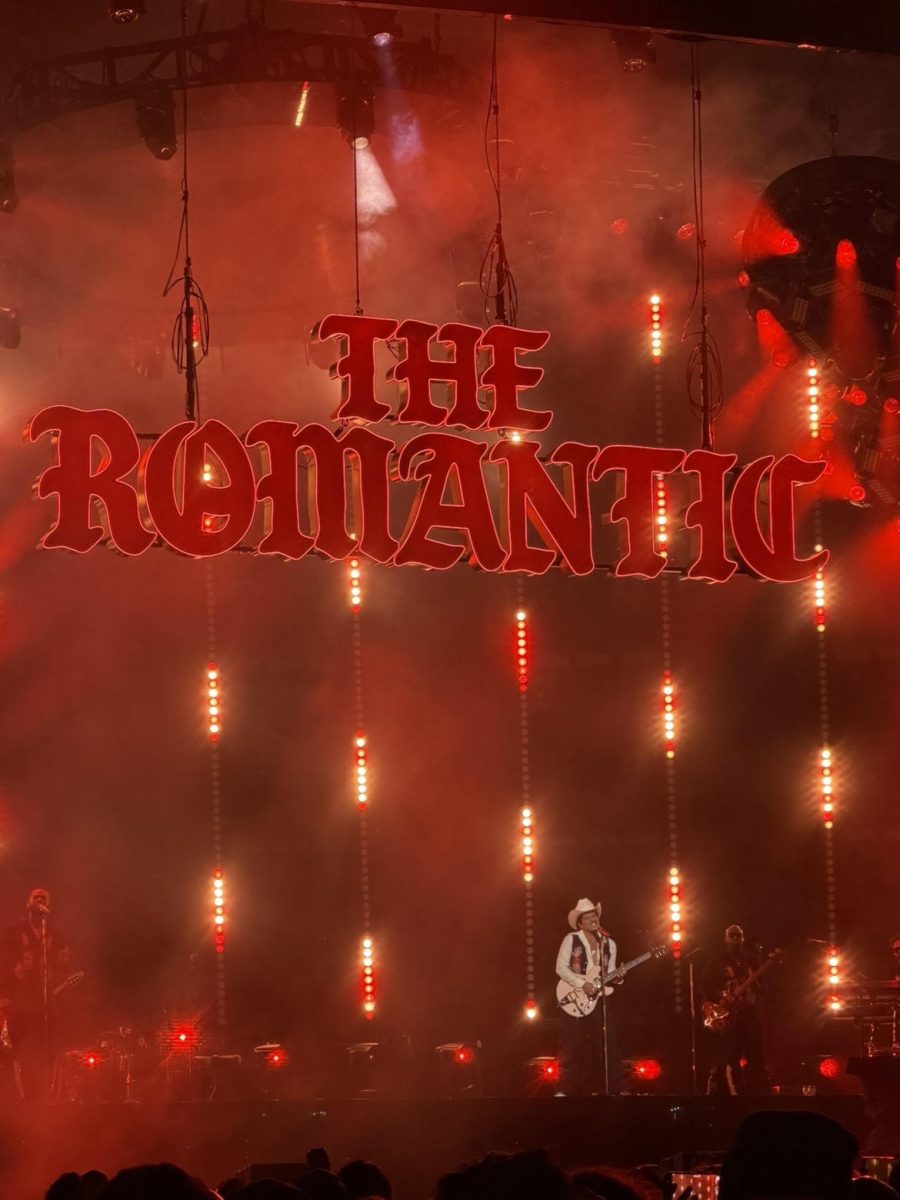 Bruno Mars performs under “The Romantic” stage display during his concert on May 3. Students describe the performance as energetic and emotional, with dramatic lighting, fireworks and crowd singalongs, “Best experience of my entire life, constant high energy and lots of tears,” sophomore Jack Gray said. Photo by Savannah Lease