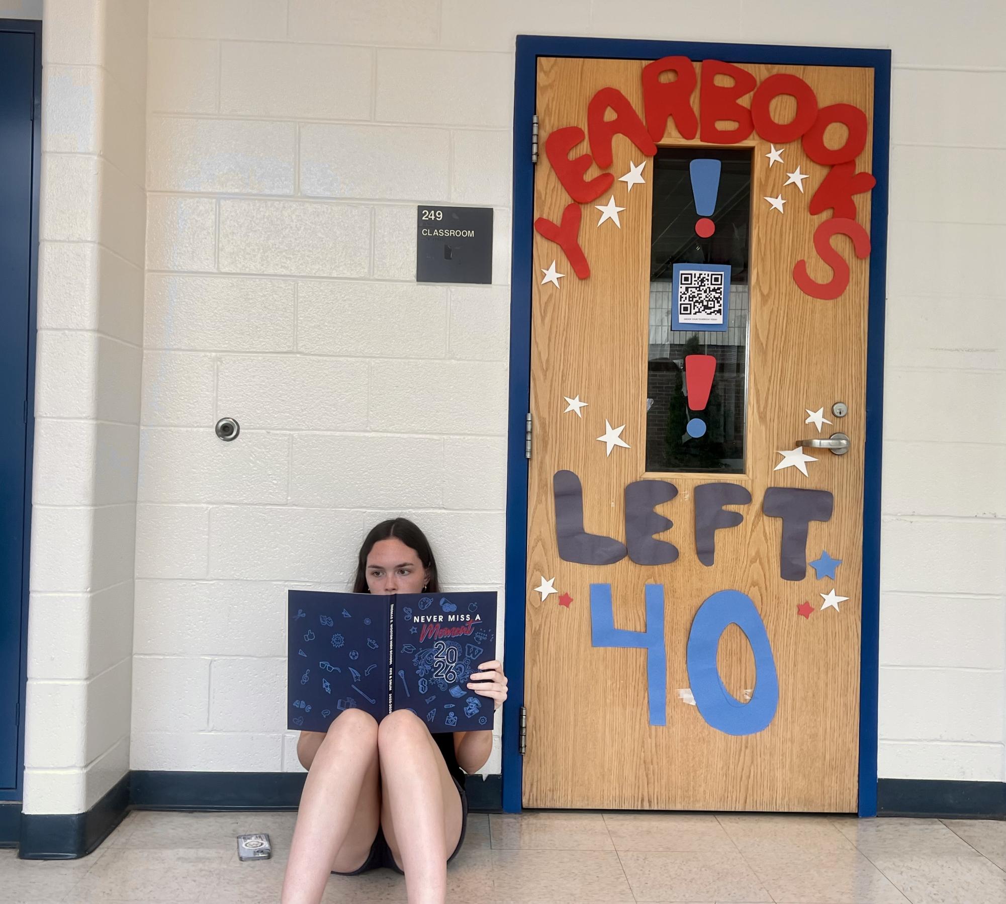 Junior editor Annika Rytting, looks through the yearbook and reminisces about all the memories collected this year. "I've already looked through the entire yearbook 10 times, I'm so happy with how it turned out," Rytting said.