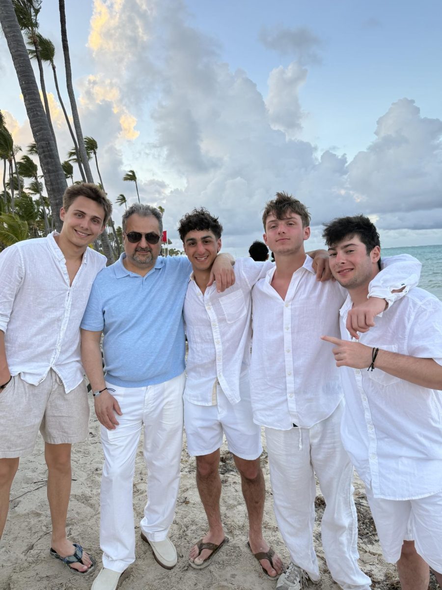 Senior Bryson Filbert, parent Amir Kaz and seniors Cyrus Kaz, Blake Graham and Nathan Zweig enjoy Punta Cana over spring break with their classmates, one of the many memories of being in high school that they will cherish forever.