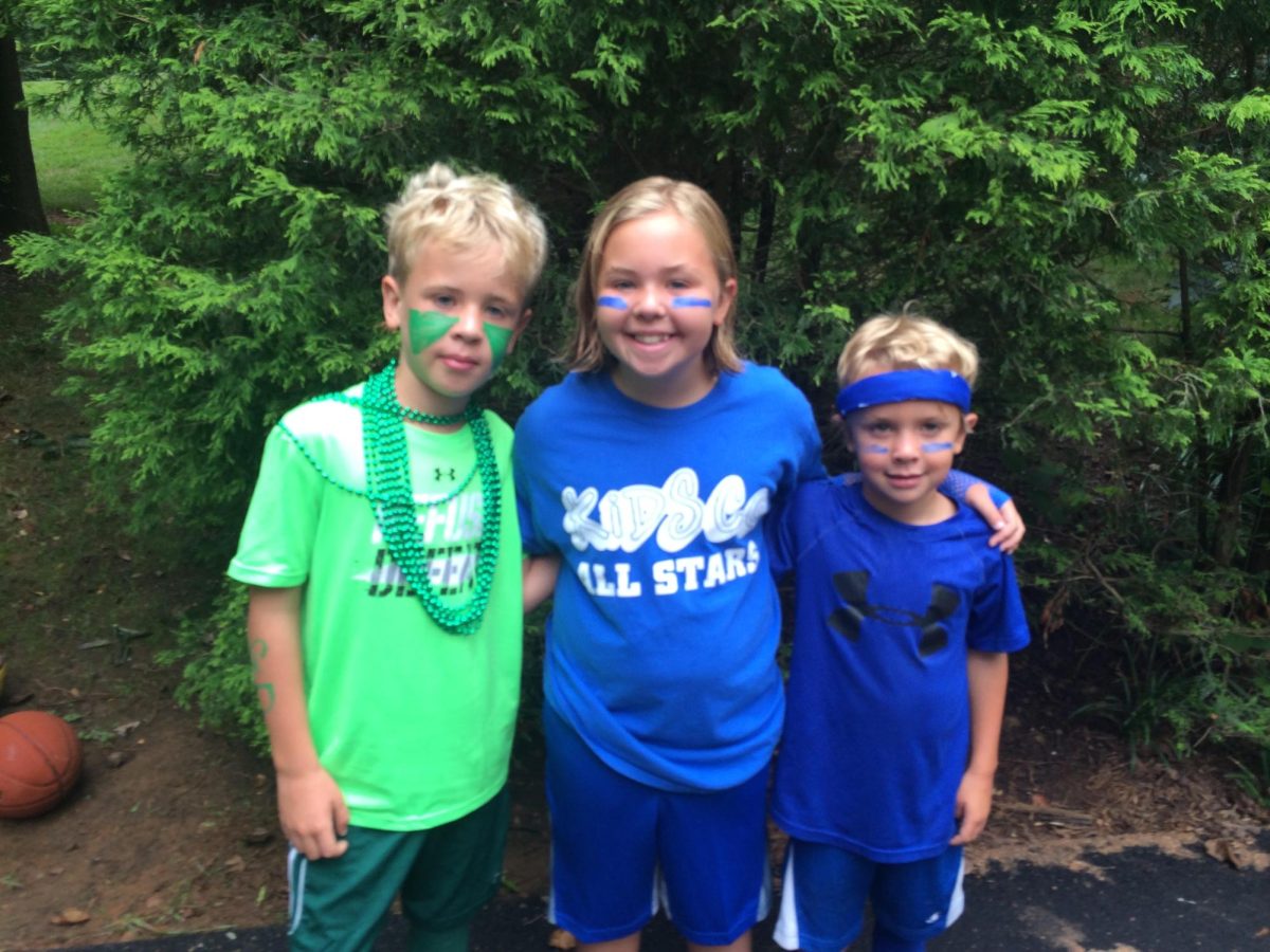 Eric Mehler (this writer, right), his sister Elizabeth Mehler (middle) and his brother Thomas Mehler (left) before KidsCo summer camp Color War in 2016. Photo by Lynn Mehler