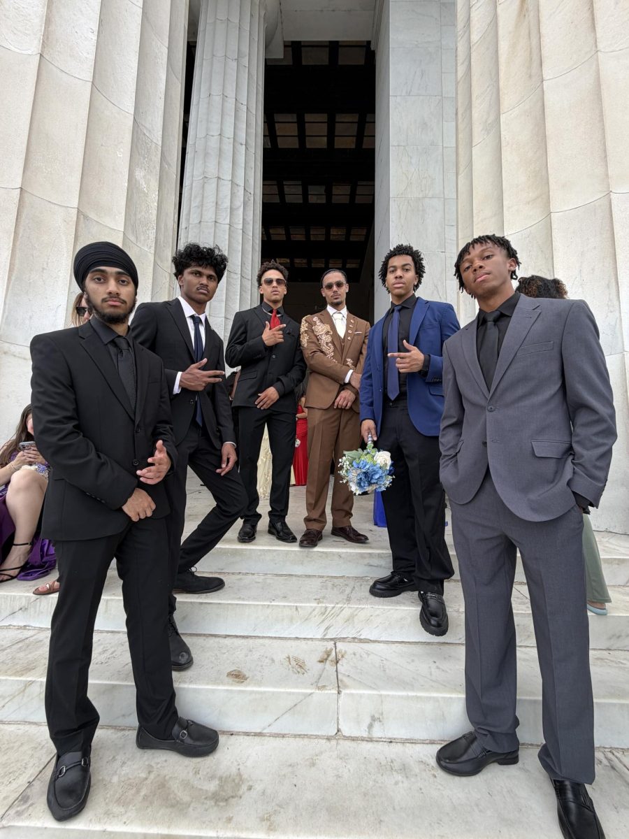 Seniors Zorawar Sodhi, Rahul Basam, Chase Mitchell, Shavont Cormier, Farai Fraser and Joshua Derrell at the Washington Monument to take photos before prom at Pinstripes. Photo courtesy Zorawar Sodhi