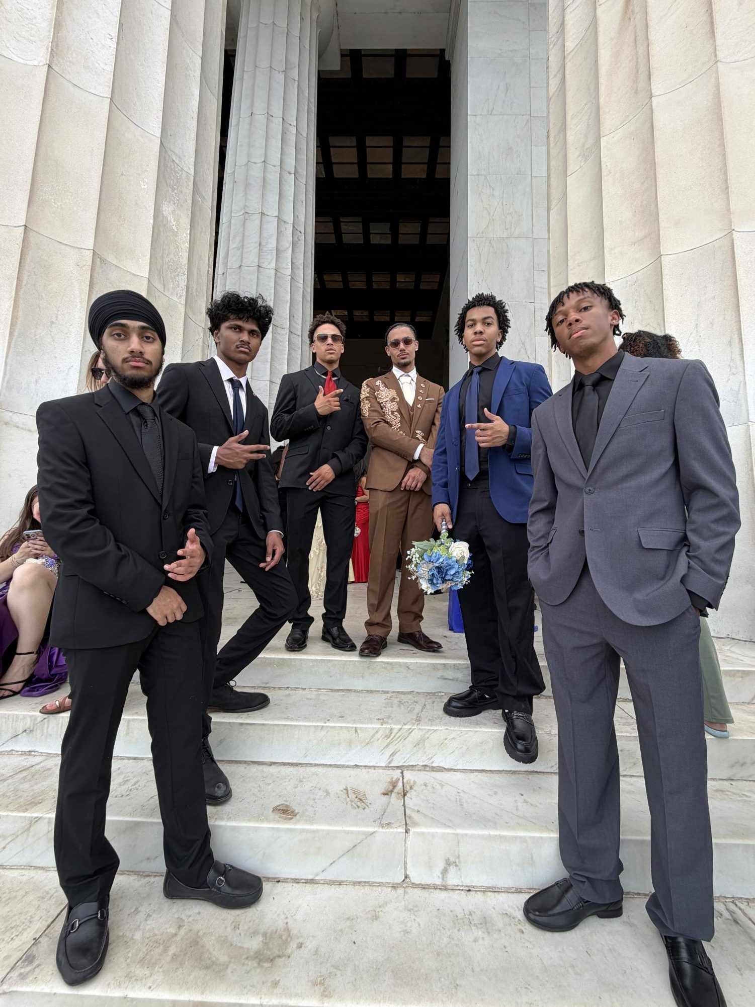 Seniors Zorawar Sodhi, Rahul Basam, Chase Mitchell, Shavont Cormier, Farai Fraser and Joshua Derrell at the Washington Monument to take photos before prom at Pinstripes. Photo courtesy Zorawar Sodhi