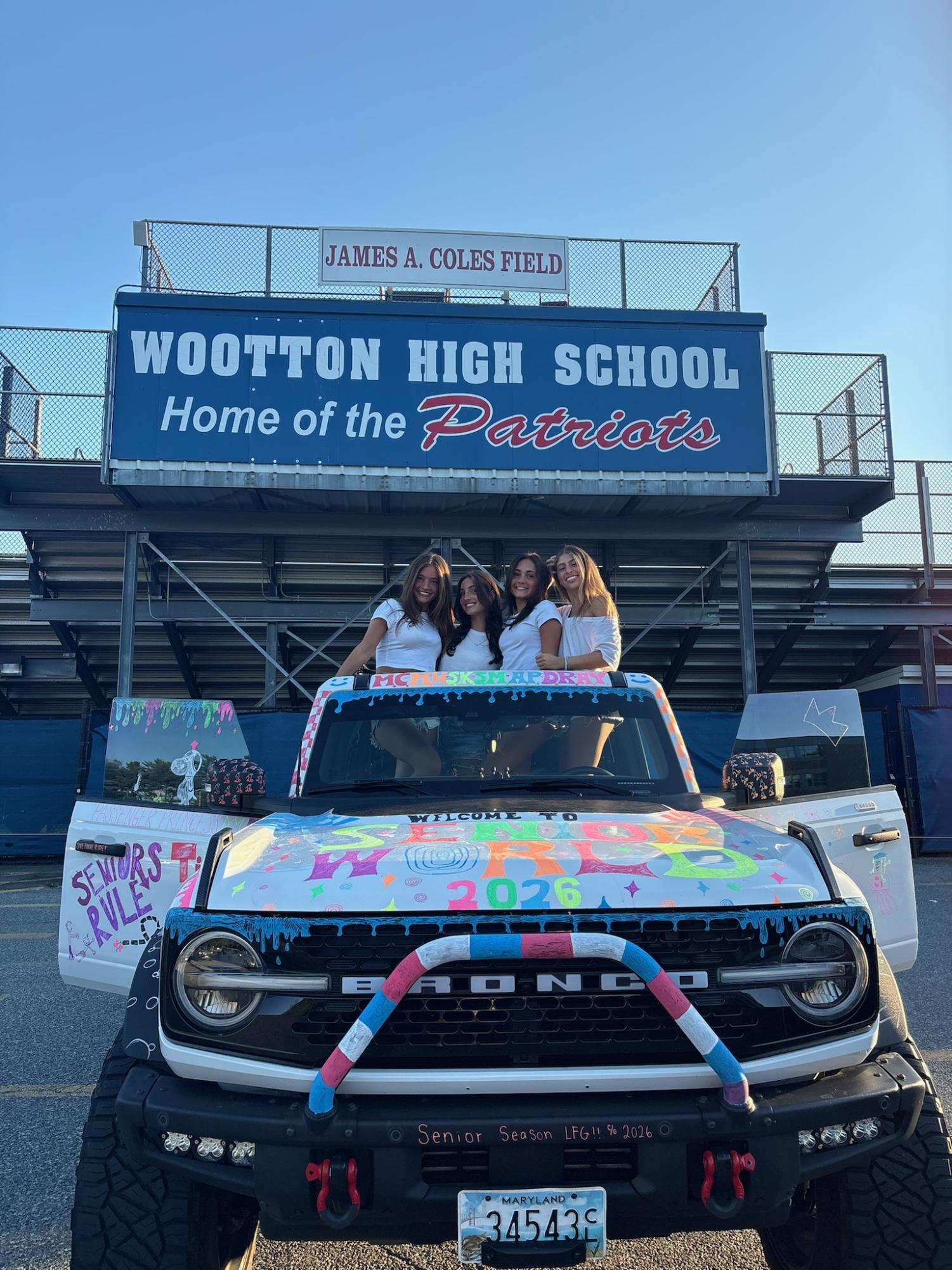 Senior Marley Hoffman with friends Siena McCarthy, Mia Coven and Danielle Rubin celebrate their last, first day of high school with car decorating.