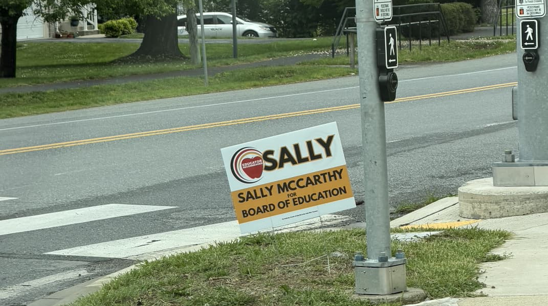 Sally McCarthy is running for the Board of Education. Signs for candidates are plastered throughout Montgomery County, and people put them in front of their homes.